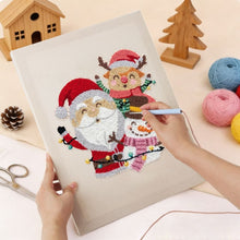 Laden Sie das Bild in den Galerie-Viewer, Punch Needle mit Rahmen - Weihnachtsmann und Freunde