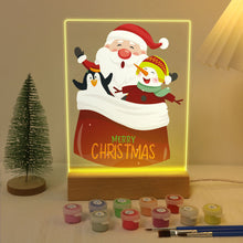 Laden Sie das Bild in den Galerie-Viewer, LED Präsentationssockel aus Holz Malen nach Zahlen 15x20 cm - Weihnachtsmann 02