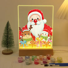 Laden Sie das Bild in den Galerie-Viewer, LED Präsentationssockel aus Holz Malen nach Zahlen 15x20 cm - Weihnachtsmann 04